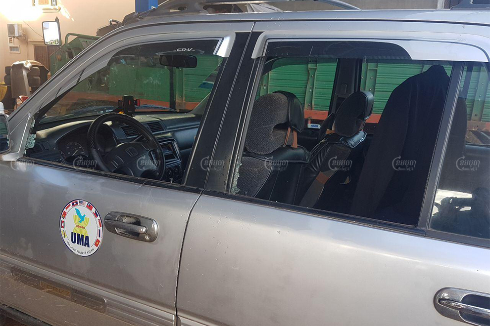 A photo shows the smashed windows of UMA TV Online journalist Him May's Honda CRV on October 20.