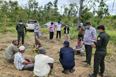 Kratie authorities investigate potential land clearing in the province on December 2, in relation to which three journalists were charged for extortion. Supplies