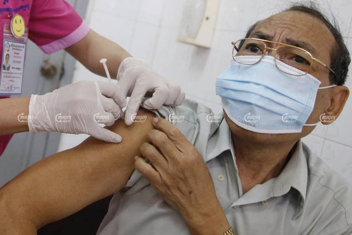 A Cambodian man gets the AstraZeneca vaccine at Phnom Penh’s National Pediatric Hospital on March 10. CamboJA/ Panha Chhorpoan