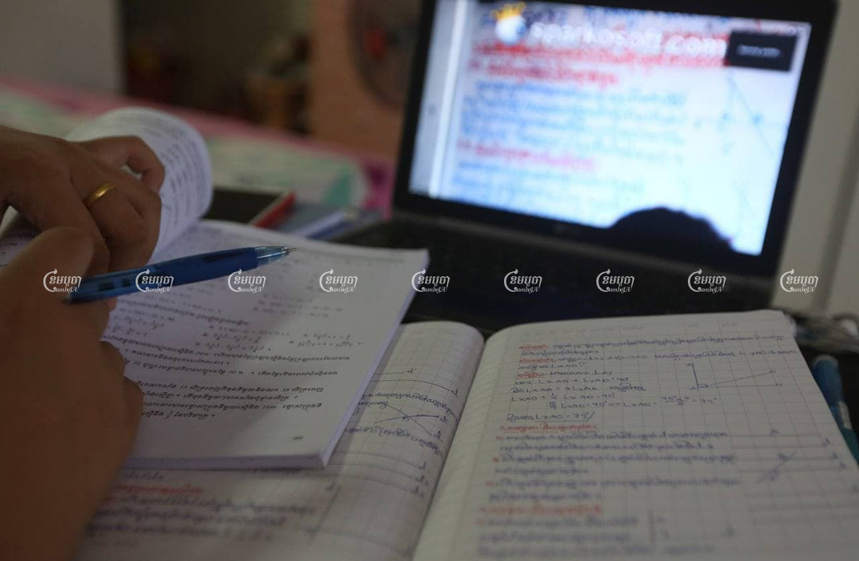 A student completes online lessons at home in Phnom Penh, March 11, 2021. CamboJA/ Pring Samrang