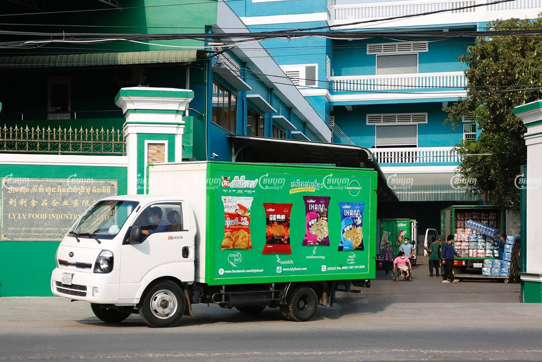 A truck leaves the LY LY Food Industry, an SME food manufacturer, premises on March 30. CamboJA/ Panha Chhorpoan