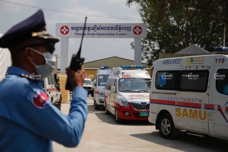 Ambulances leave the Phnom Penh Quarantine Center with COVID-19 patients after Prime Minister Hun Sen ordered that people in quarantine and infected patients should not be kept at the same site. CamboJA/ Panha Chhorpoan