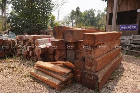 Timber seized from the Prey Lang Wildlife Sanctuary is stored at a government building in Kratie province. Panha Chhorpoan