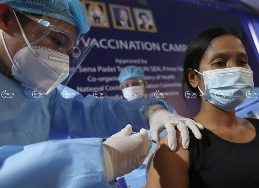 A woman receives a jab of the Sinovac vaccine in Phnom Penh, April 1, 2021. CamboJA/ Pring Samrang
