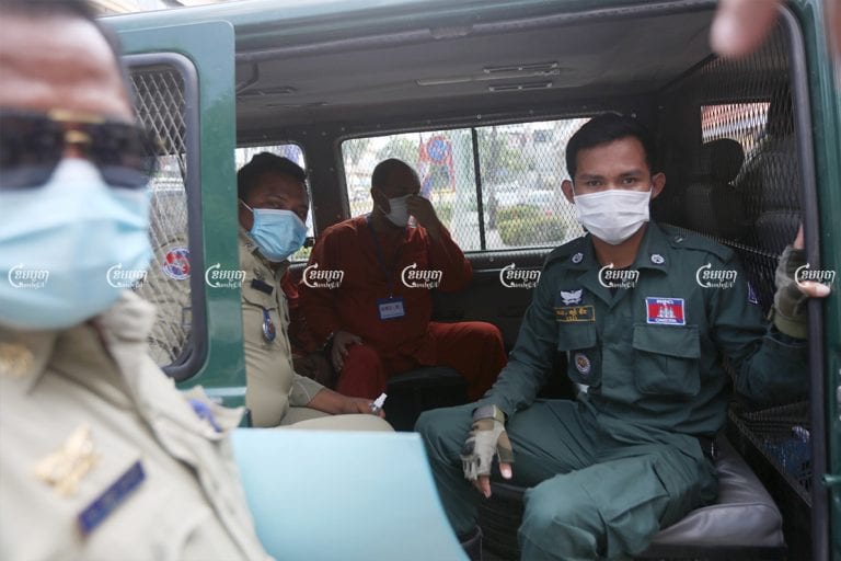 Former police general Ung Chanthuok arrives at Phnom Penh Municipal court ahead of his trial for breaching COVID lockdown guidelines, April 29, 2021. CamboJA/ Pring Samrang