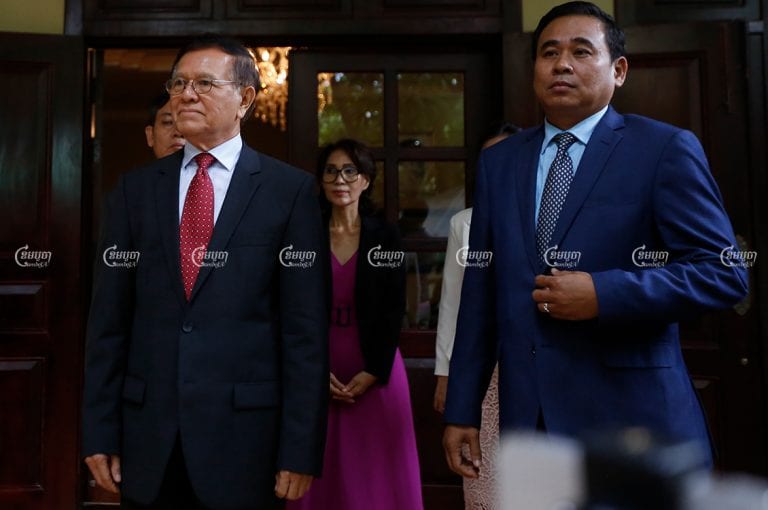 Kem Sokha’s Cabinet Chief Muth Chantha (R), and Kem Sokha wait to meet visitors, in Phnom Penh, November 11, 2019. CamboJA/ Pring Samrang