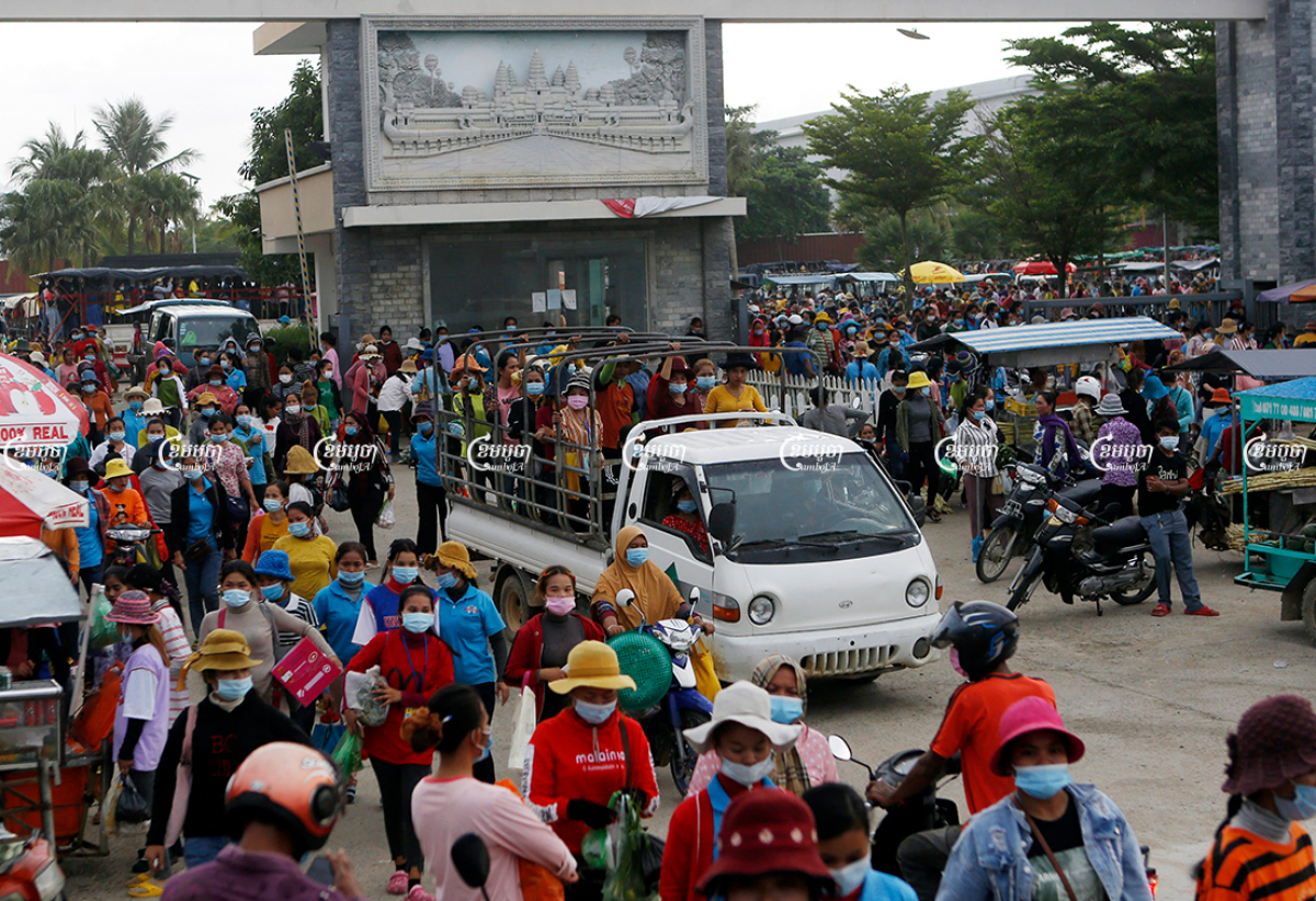 Garment workers leave a factory after finishing their work in Kampong Speu province, May 6, 2021. CamboJA/ Panha Chhorpoan