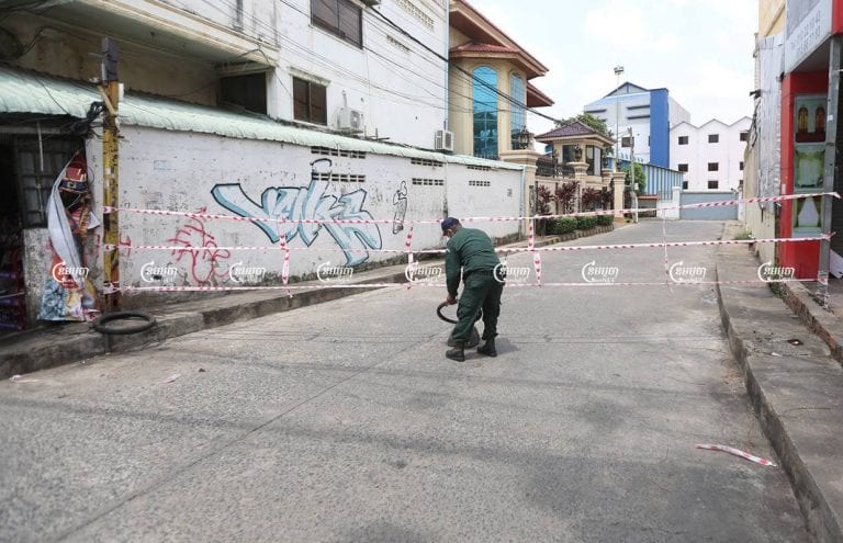 Police block a road leading into a red zone in Stung Meanchey I commune, April 29, 2021. CamboJA/ Pring Samrang