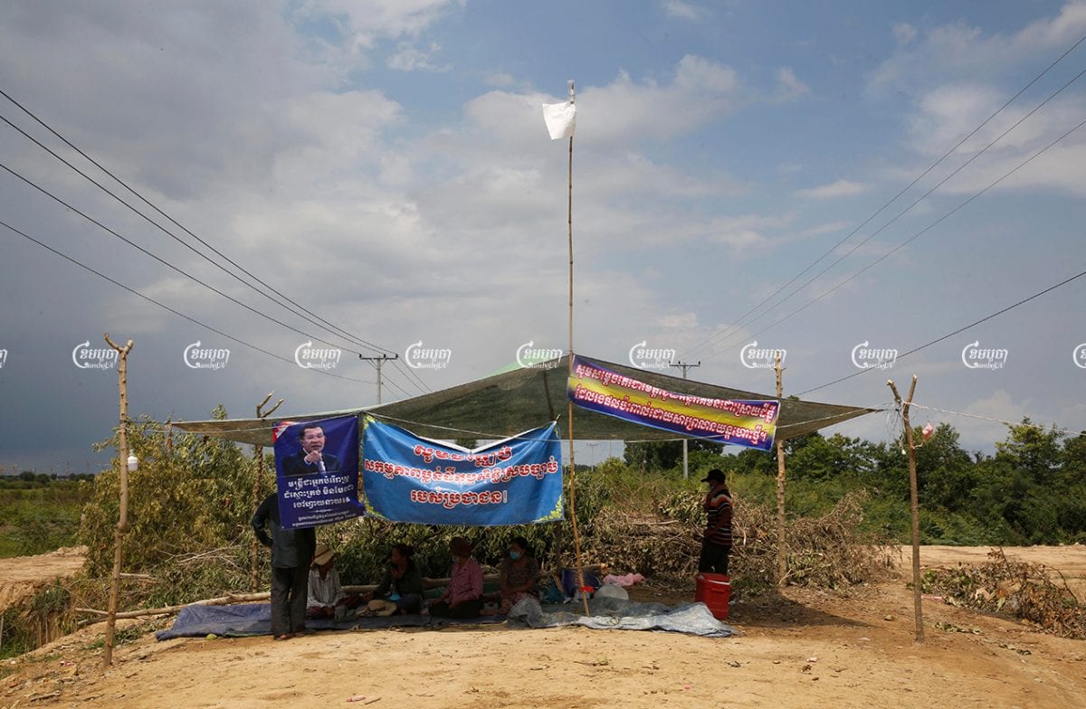 Villagers set up camp to block a street leading to a new airport construction site. The development is locked in a dispute with villagers in Kandal province's Kandal Stung district, May 17, 2021. CamboJA/ Panha Chhorpoan