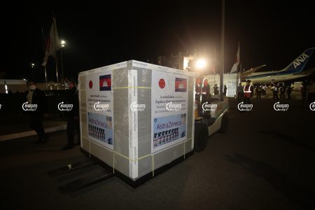 A box with 332,000 doses of AstraZeneca donated by Japan arrives at Phnom Penh International airport on Friday night, July 23, 2021. CamboJA/ Panha Chhorpoan
