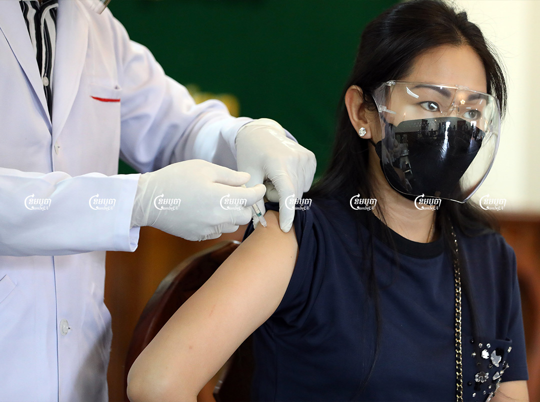 A woman receives a dose of the COVID-19 vaccine in Phnom Penh, Picture taken on April 1, 2021. CamboJA/ Pring Samrang