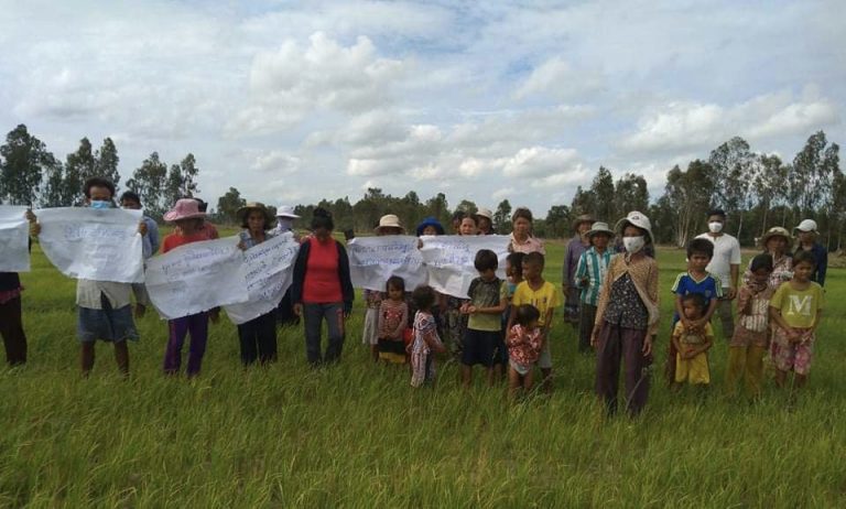 Villagers protesting on August 2 on farmland within the disputed boundary of a Svay Rieng canal restoration project. Supplied