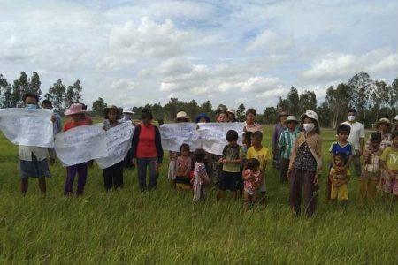 Villagers protesting on August 2 on farmland within the disputed boundary of a Svay Rieng canal restoration project. This week, 60 families connected to the protest were placed in quarantine after two villagers tested positive for COVID-19. Supplied photo.
