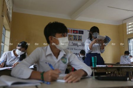 Students study in their classroom on the first day of their school's reopening in Phnom Penh on September 15, 2021. CamboJA/ Pring Samrang