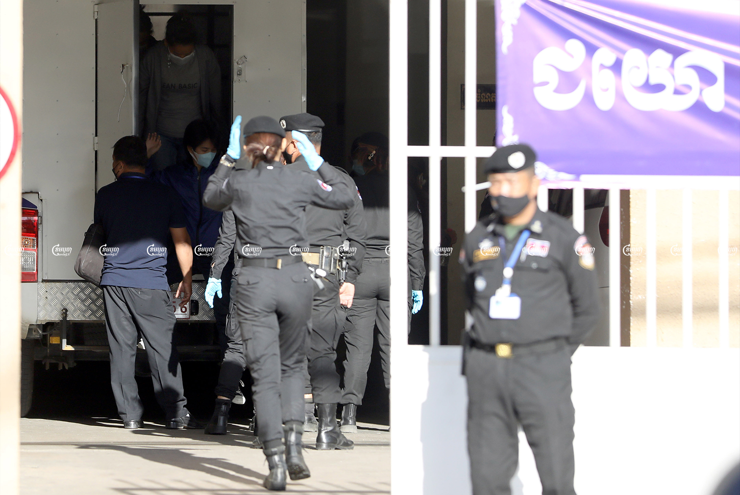 NagaWorld union members arrested for their involvement in the peaceful strikes arrived Monday at the Municipal Court of Phnom Penh for questioning, January 3, 2022. CamboJA/ Pring Samrang
