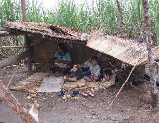 Residents who have had their homes demolished by the authorities build temporary shelters in 2009. Supplied