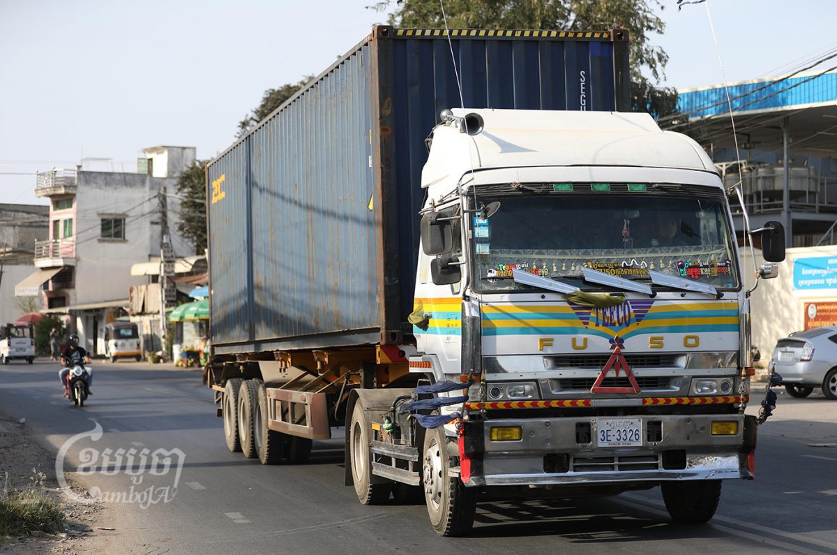 A container truck transports goods on the outskirts of Phnom Penh, February 2, 2022. CamboJA/ Pring Samrang