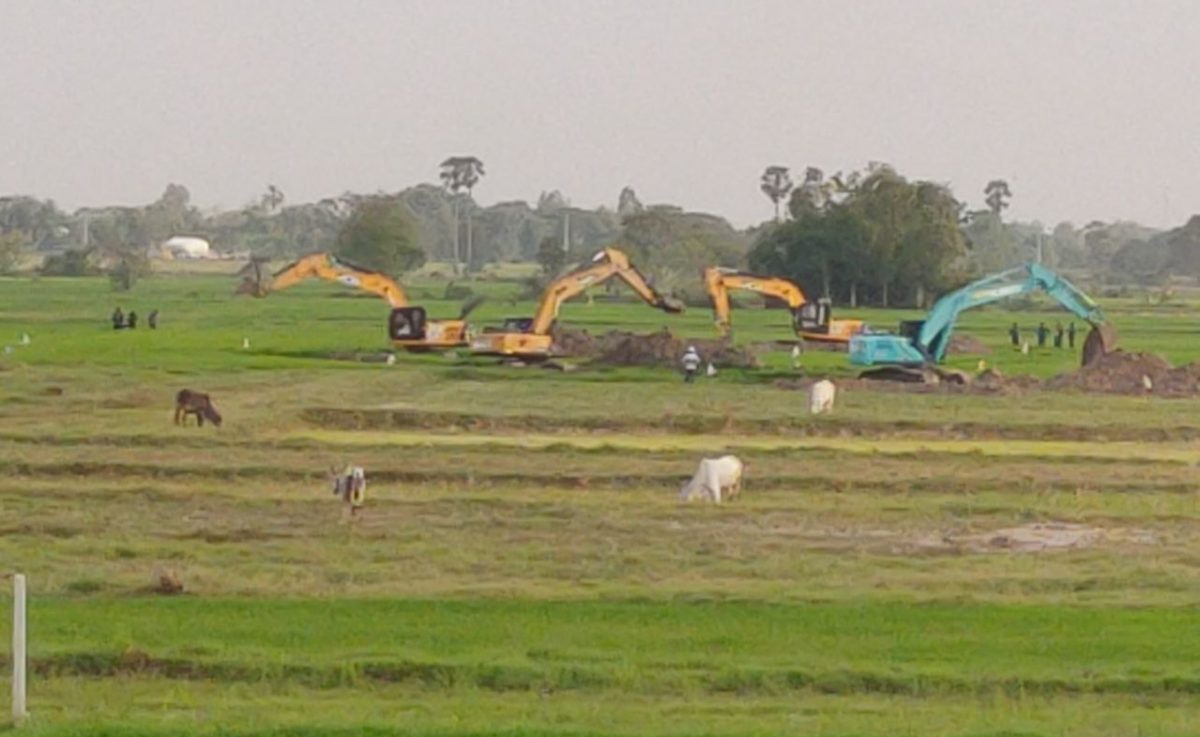 Excavators clear the rice fields of villagers to build the new mega airport in Kandal province. Photo taken on February 9, 2022. Supplied