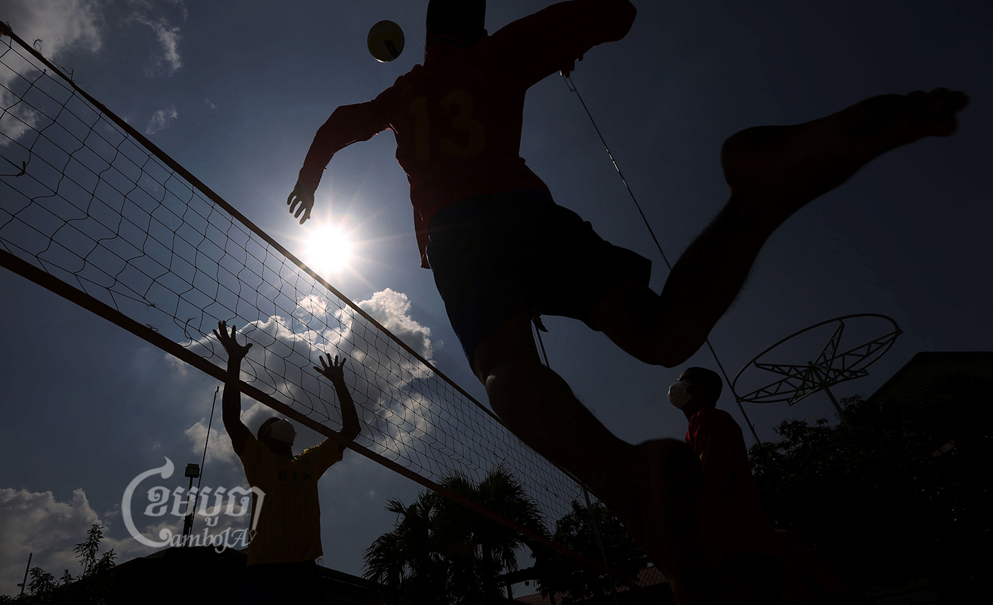 Men play volleyball at the Drug Addict Relief Treatment Training Association center in Phnom Penh, Picture taken February 4, 2022. CamboJA/ Pring Samrang
