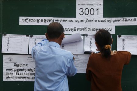 Commune counsellors check voter lists during a Senate election in Takhmao, Kandal province. Picture taken February 25, 2018. CamboJA/ Pring