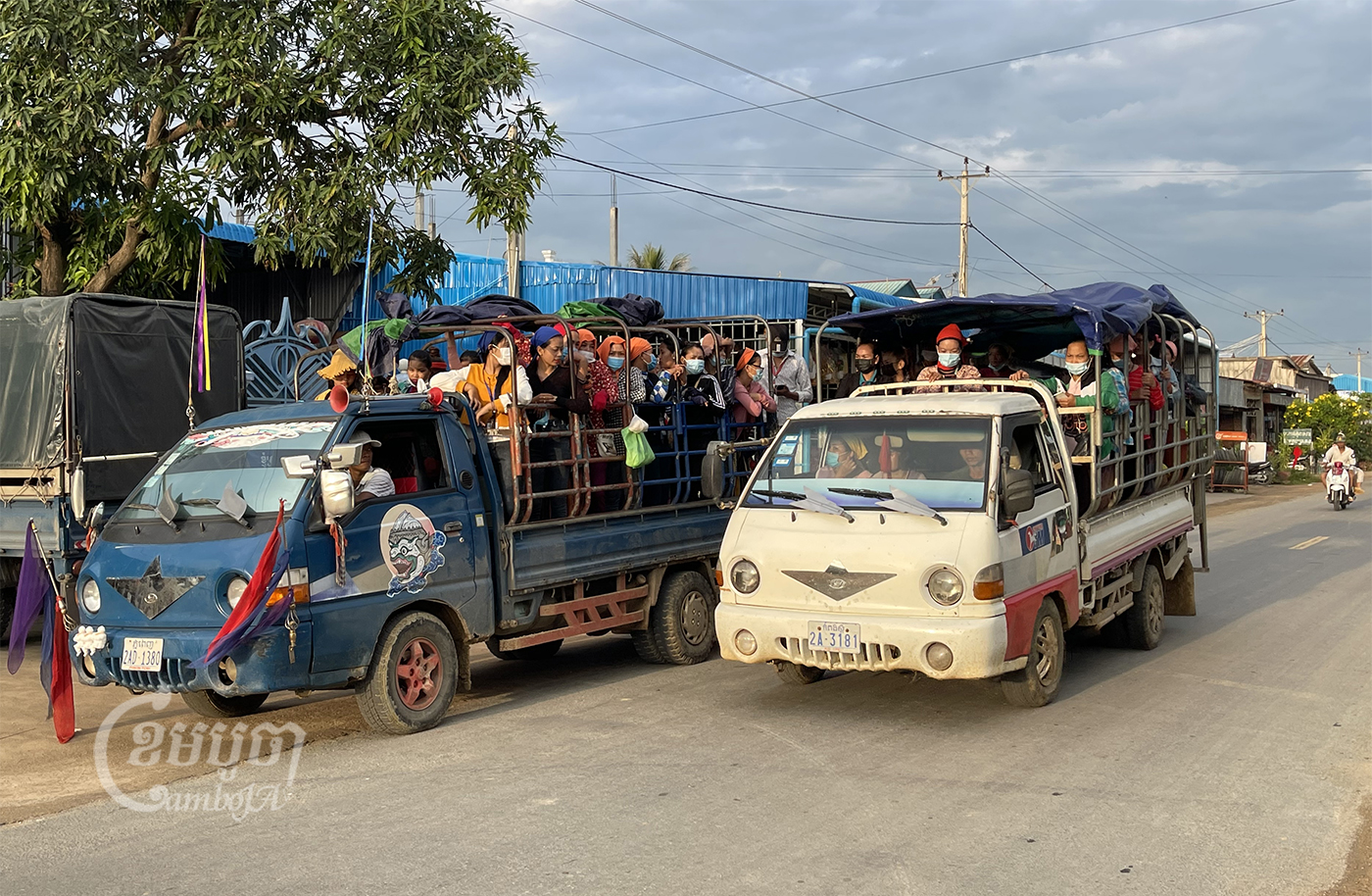Garment workers travel to work on trucks in Kampong Speu province, Picture taken October 2, 2021. CamboJA/ Pring Samrang