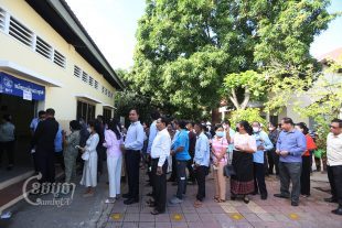 Villagers vote at a polling station in Kandal province’s Takhmao city on June 5, 2022. CamboJA/ Pring Samrang