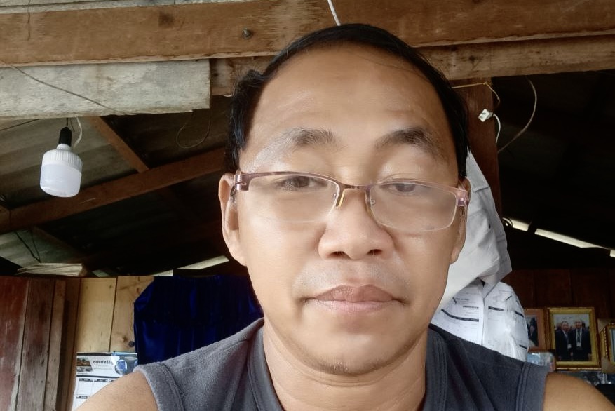 Yuon Chhiv, the publisher of Koh Kong Hot News, in his home after he was released from prison. Supplied