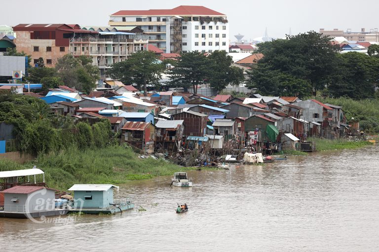 By late September, the majority of families in Russei Keo district’s Phsar Toch village agreed to relocate to the outskirts of Phnom Penh, following months of pressure from authorities seeking to develop the village’s prime waterfront real estate, seen here on July 20, 2022. (CamboJA/ Pring Samrang)