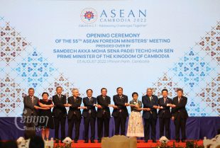 Cambodian Prime Minister Hun Sen has a group photo with ASEAN Foreign Ministers during the opening ceremony for the 55th ASEAN Foreign Ministers' Meeting in Phnom Penh, August 3, 2022. CamboJA/ Pring Samrang