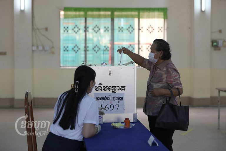 A voter casts their ballot during the June 2022 commune election. CamboJA/Samrang Pring