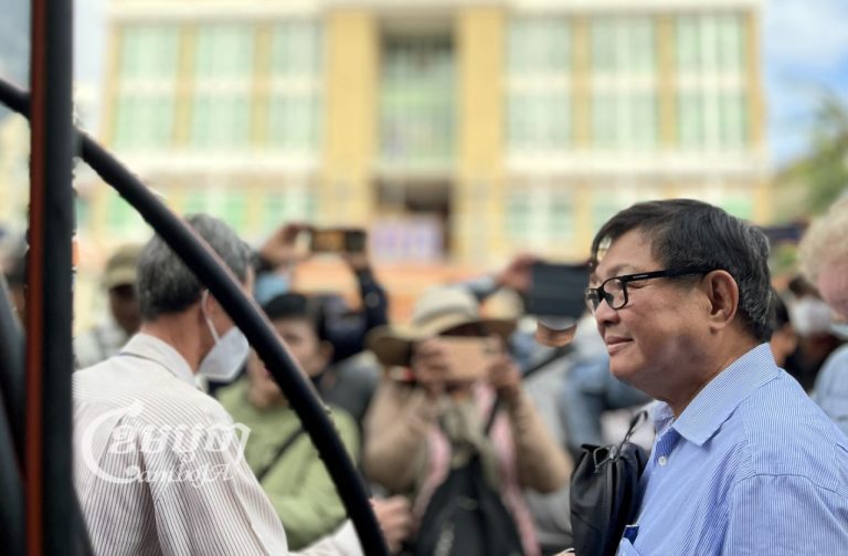 Opposition Candlelight Party deputy president Son Chhay arrives at the Phnom Penh Municipal Court on Thursday to attend his hearing in a defamation lawsuit filed by the National Election Committee. CamboJA/Pring Samrang