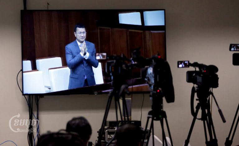 Dith Tina is seen on a television screen in a press room as the National Assembly confirmed him as Agriculture Minister on October 14, 2022. CamboJA/Panha Chhorpoan
