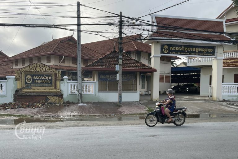 A motorist drives by the Kandal Provincial Court on October 6, 2022. CamboJA/Pring Samrang