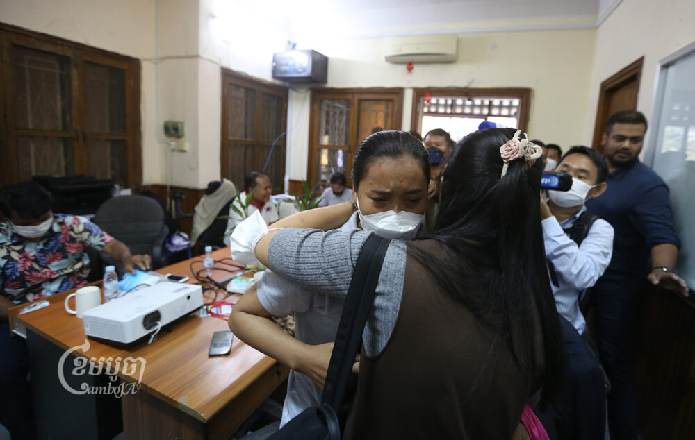 A VOD reporter cries on her last day of work at the newsroom’s office in Phnom Penh on February 13, 2023. CamboJA/ Pring Samrang