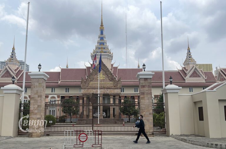 A man walks past the Ministry of Foreign Affairs and International Cooperation in Phnom Penh on March 31, 2023. (CamboJA/Pring Samrang)