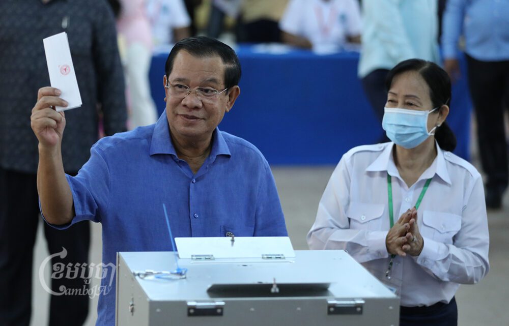 Prime Minister Hun Sen votes at a polling station in Kandal province’s Takhmao city on June 5, 2022 during a commune election. (CamboJA/Pring Samrang)