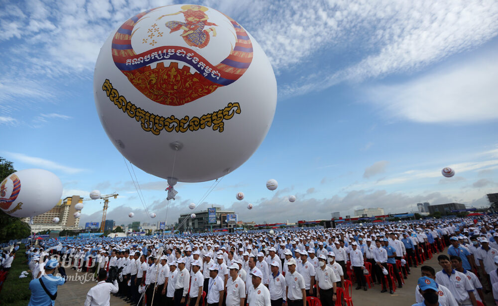 Balloons flew over the ruling CPP's rally at Diamond Island in Phnom Penh while supporters waited to march through the streets of Phnom Penh on July 1, 2023. (CamboJA/ Pring Samrang)