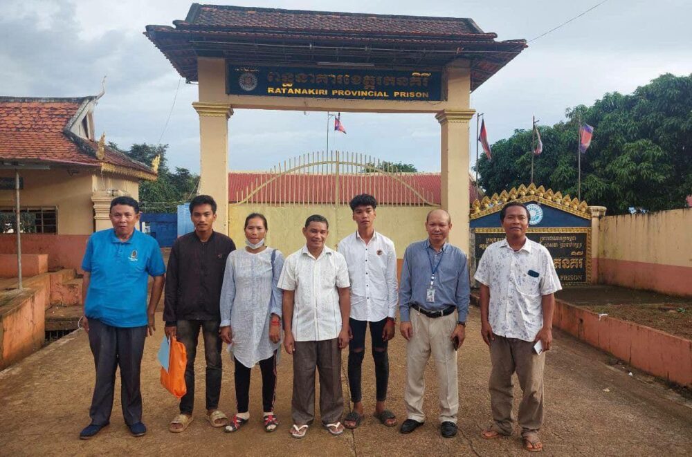 Chhorn Phalla (center) with his family and lawyer in front of the Ratanakiri provincial prison following his release on October 6, 2023. (Adhoc)