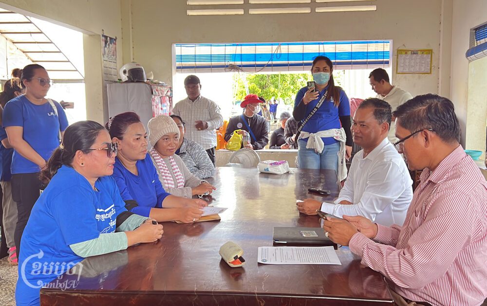 Former NagaWorld workers meet with Prime Minister Hun Manet’s Cabinet officers to submit a petition, on November 23, 2023. (CamboJA/Sovann Sreypich)