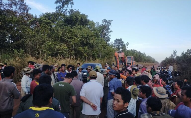 Some 200 indigenous people stop an excavator which attempted to clear their community land forest in Preah Vihear province on December 10, 2023. (Supplied)