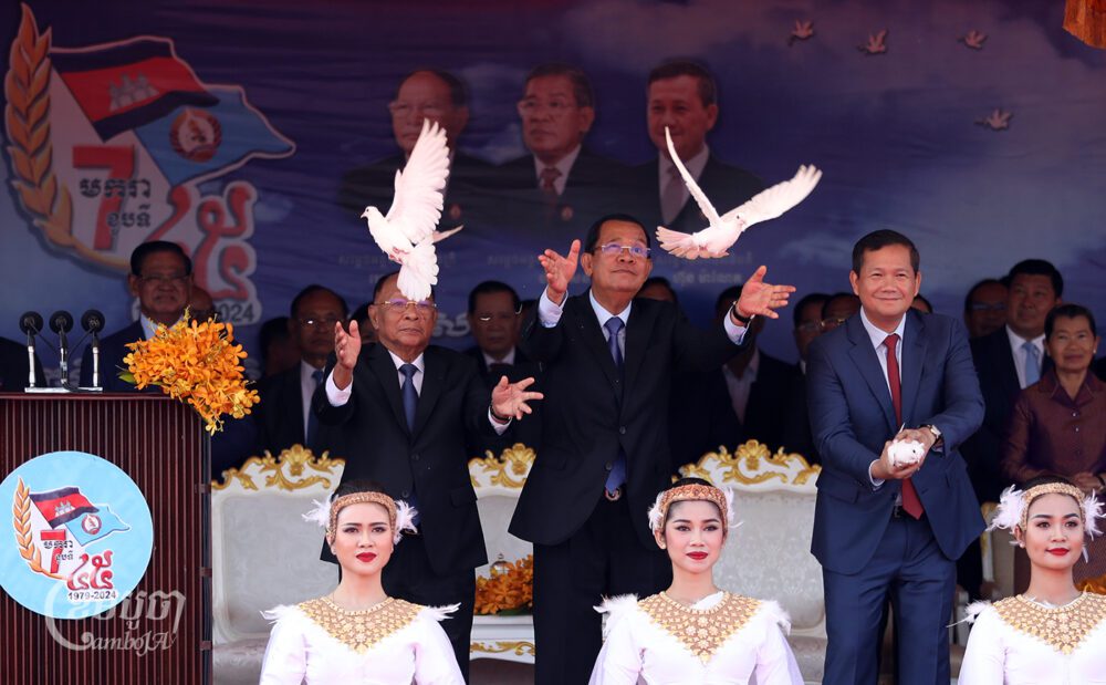 Prime Minister Hun Manet, his father and former PM Hun Sen, and CPP members at the 45th anniversary Victory Day in Phnom Penh, January 7, 2024. (CamboJA/Pring Samrang)