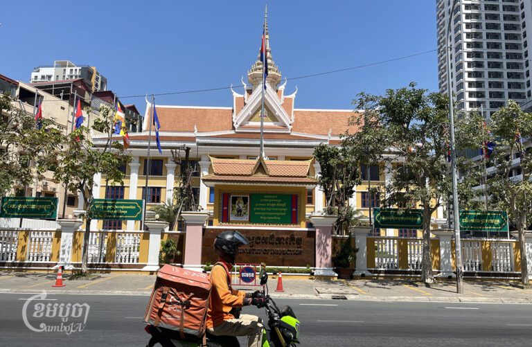 A motorist rides past the Ministry of Inspection in Phnom Penh, February 13, 2024. (CamboJA/Pring Samrang)