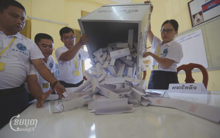 NEC officials count ballots in the Senate election at the Preah Sisowath High School polling station in Phnom Penh on February 25, 2024. (CamboJA/Pring Samrang)
