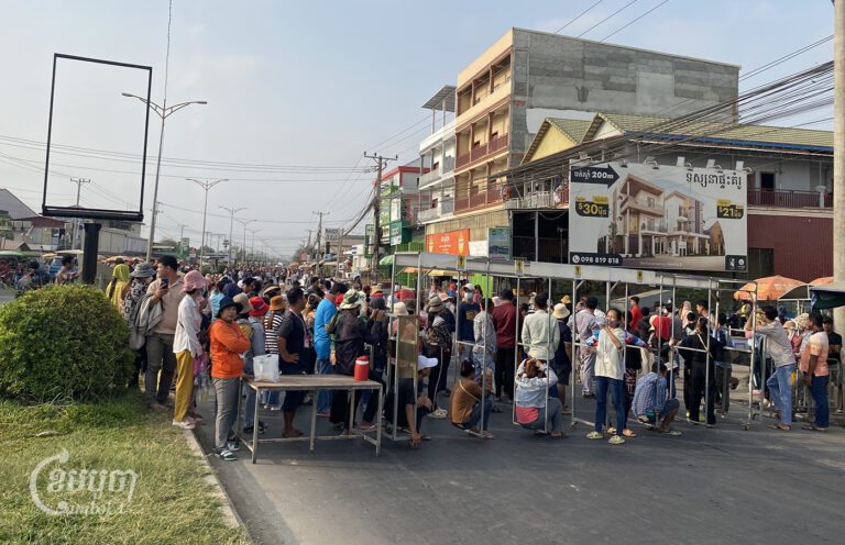 Around 600 workers of Y&W Garments Co.,LTD protest in front of the factory to ask the Ministry of Labor for intervention on March 9, 2024. (CamboJA /Runn Sreydeth)