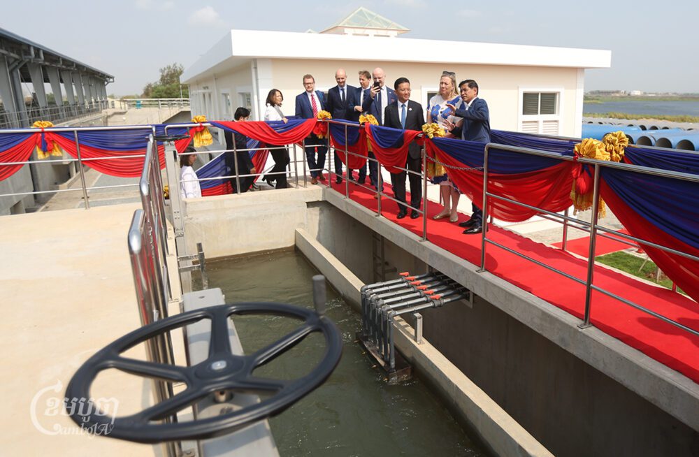 Jutta Urpilainen, European Commissioner for International Partnerships and Minister of Industry, Science Technology and Innovation Hem Vanndy at the Bakheng Water Treatment Plant in Phnom Penh on March 13, 2024. (CamboJA/ Pring Samrang)