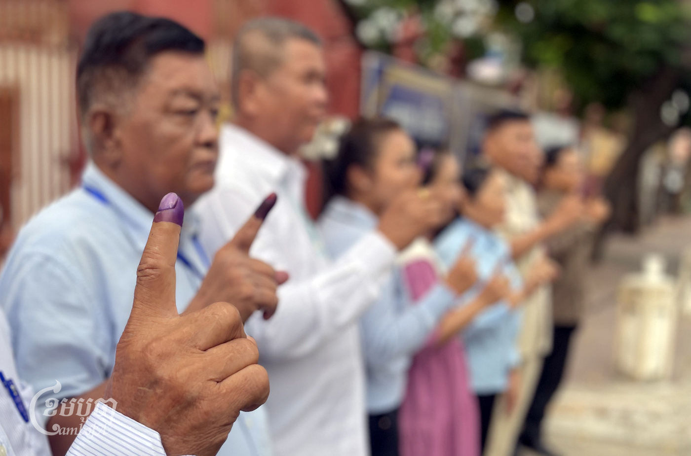 We have voted … Community members show their fingers marked with indelible ink after voting at the council election in Phnom Penh on May 26, 2024. (CamboJA/Pring Samrang)