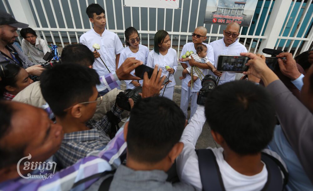 Mother Nature activists and other environmental activists arrive at the Phnom Penh Municipal Court for their hearing after being charged for plotting against the government and insulting the King, May 29, 2024. (CamboJA/Pring Samrang)