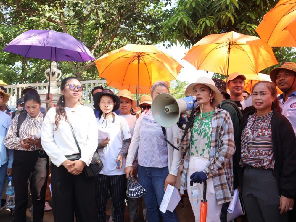 Roeun Kolap talks during a gathering outside the Ministry of Labor and Vocational Training where a petition was submitted on Labor Day on May 1, 2024. (FTUWKC)