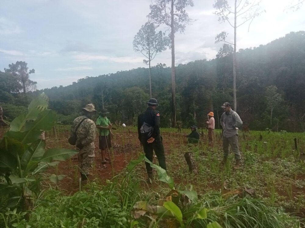 An environment officer, military police and a foreigner came to arrest Pork Nget at his rotational farm in Koh Kong province’s Thmar Baing district on June 27, 2024. (Supplied from community)