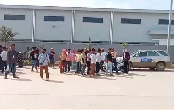 Garment workers protest in front of Tonewin (Cambodia) Apparel Co., Ltd in GiGa special economic zone in Svay Rieng province where garment workers protest to request administrative and accounting staff removed from the factory on October 21, 2025. (CUMW facebook page)